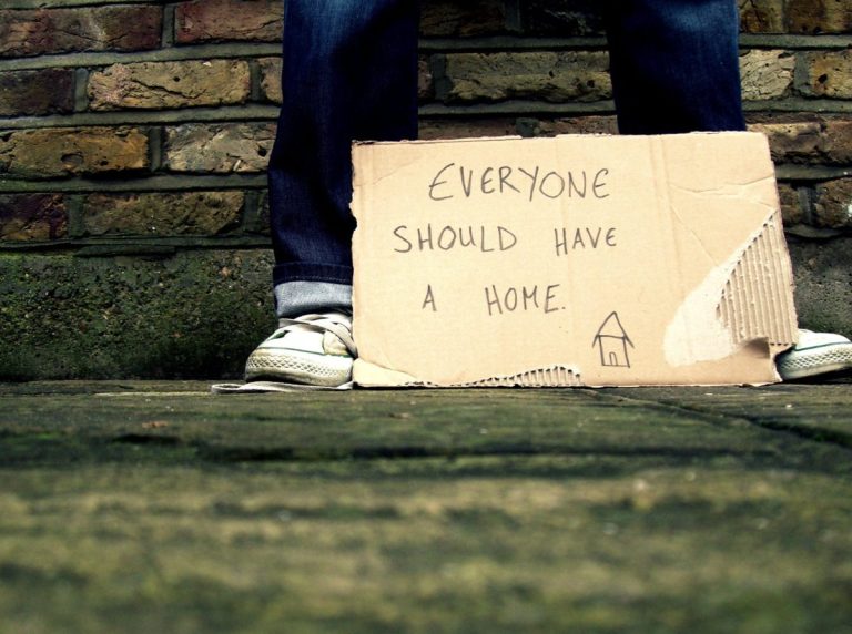 A piece of cardboard that reads