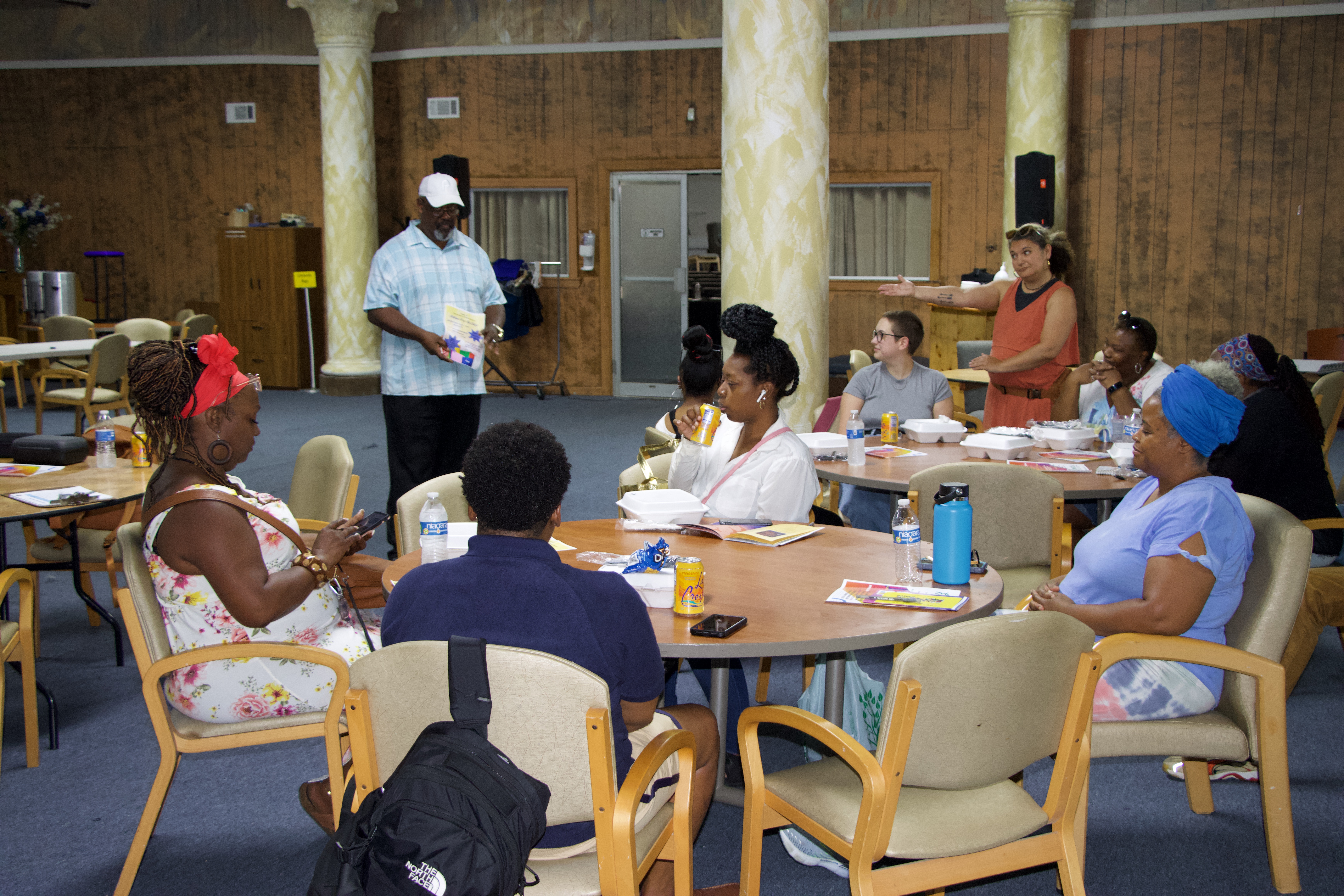Community members gather at a Documenters Info Session in the Germantown neighborhood.