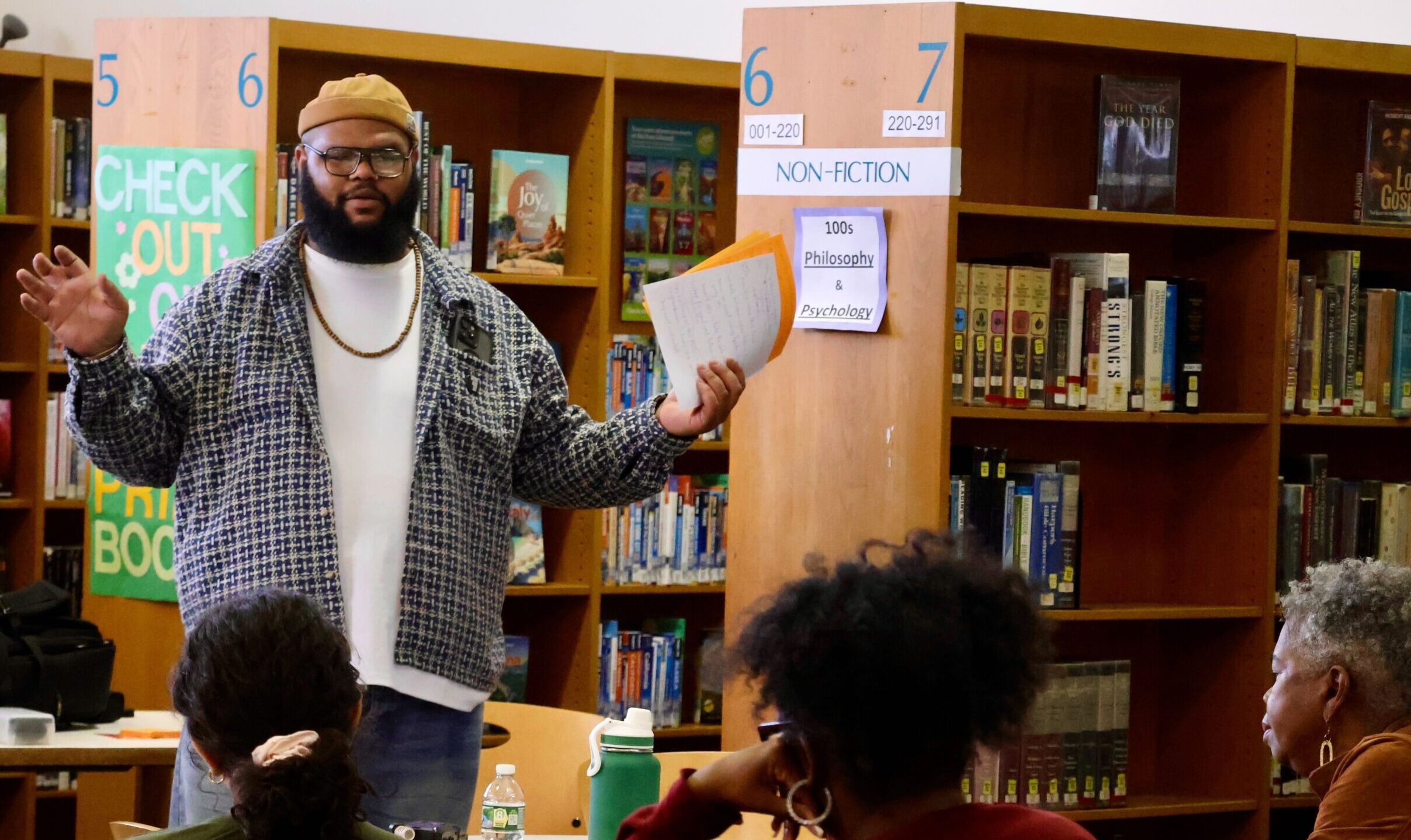 Rasheed speaking to community members